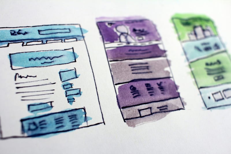 Watercolour wireframes for three screens